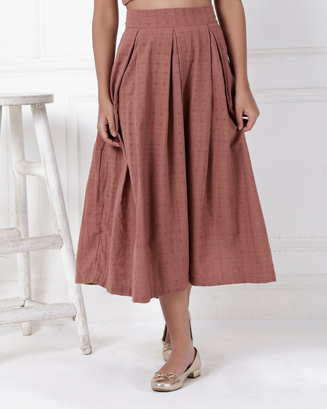 Brown box pleat cotton skirt online available at bebaakstudio.com