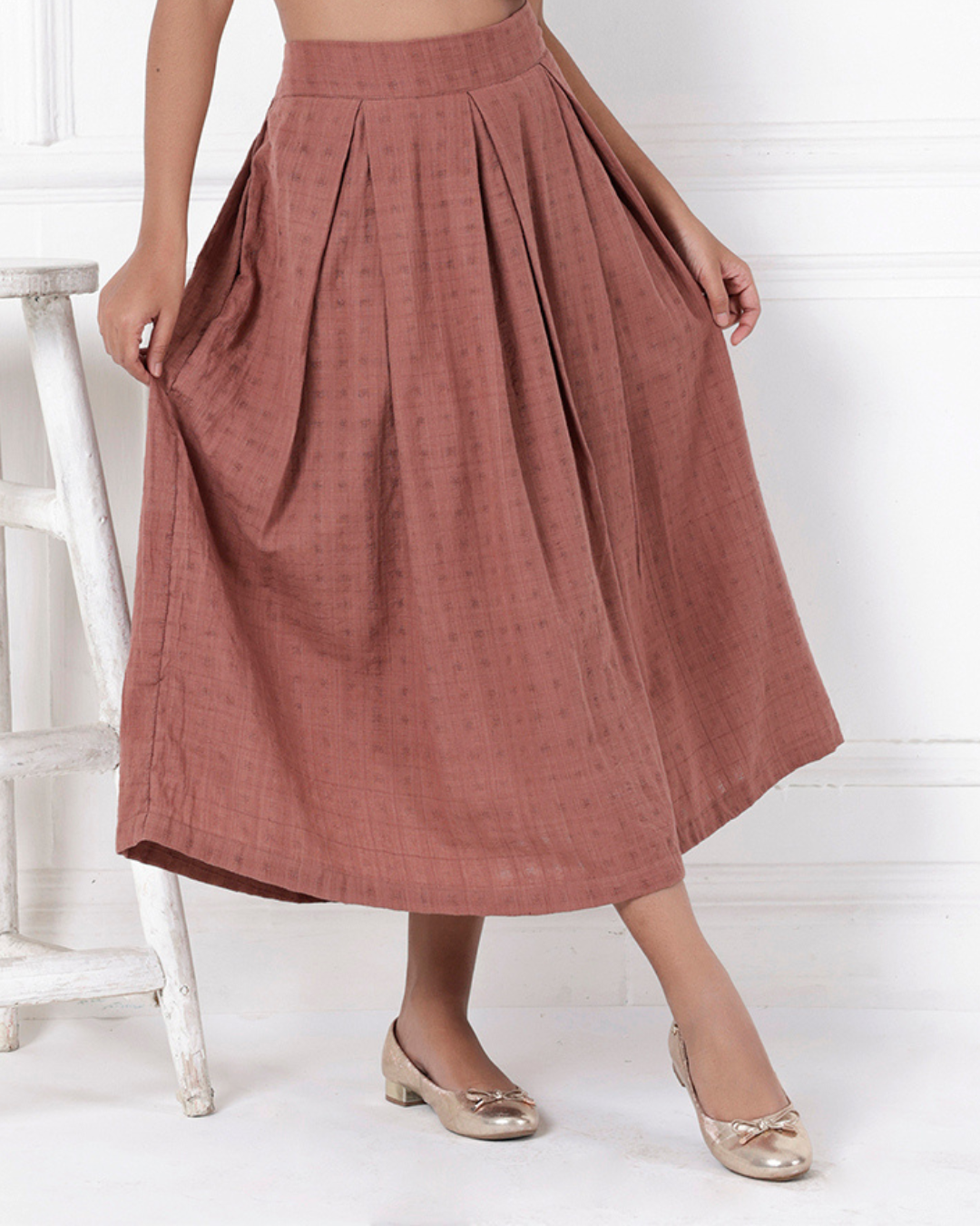 Brown box pleat cotton skirt online available at bebaakstudio.com