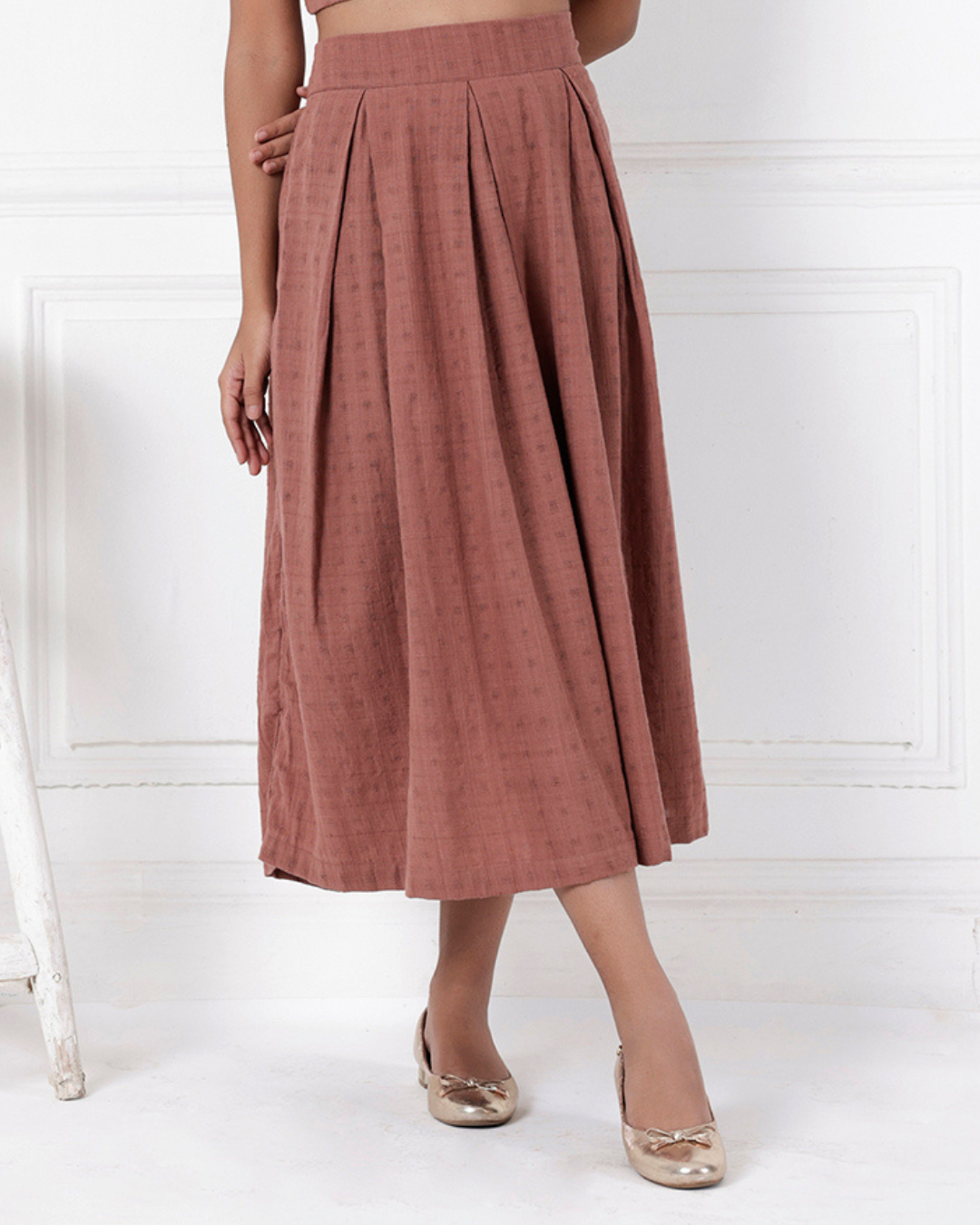 Brown box pleat cotton skirt online available at bebaakstudio.com