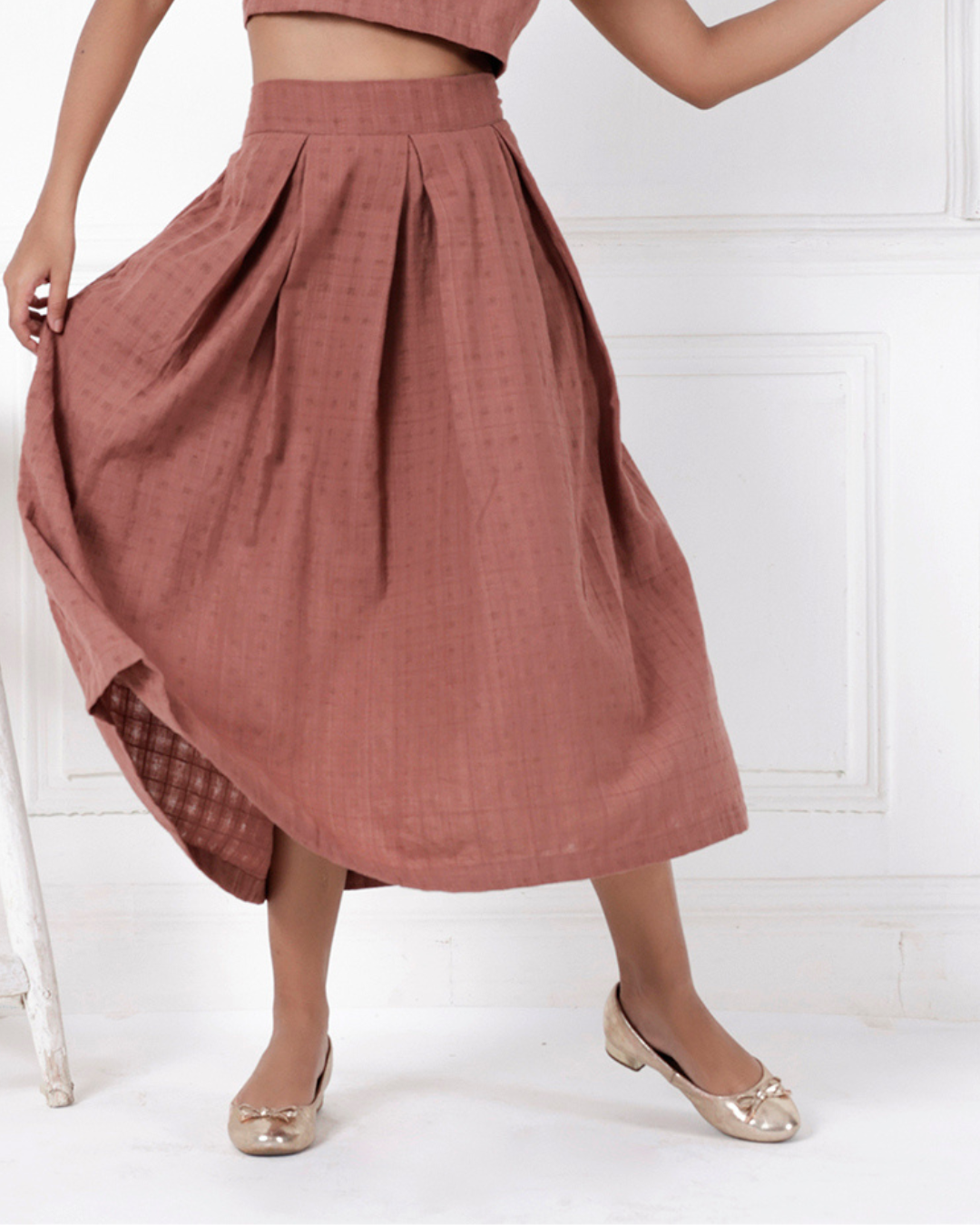 Brown box pleat cotton skirt online available at bebaakstudio.com