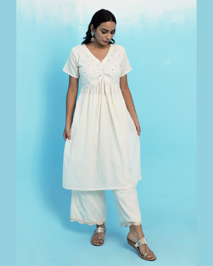 Ecru muslin cotton embroidered kurta set online at bebaakstudio.com