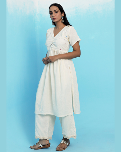 Ecru muslin cotton embroidered kurta set online at bebaakstudio.com