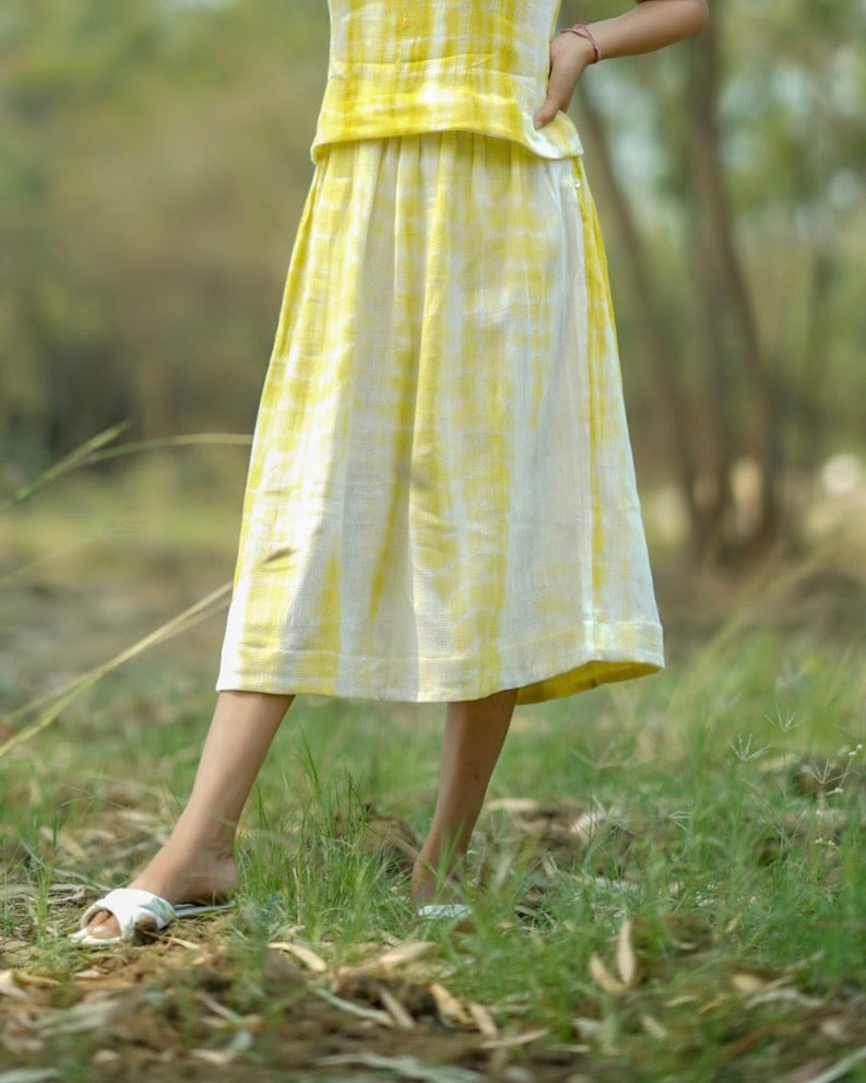 Shop yellow pleat midi skirt from Bebaak