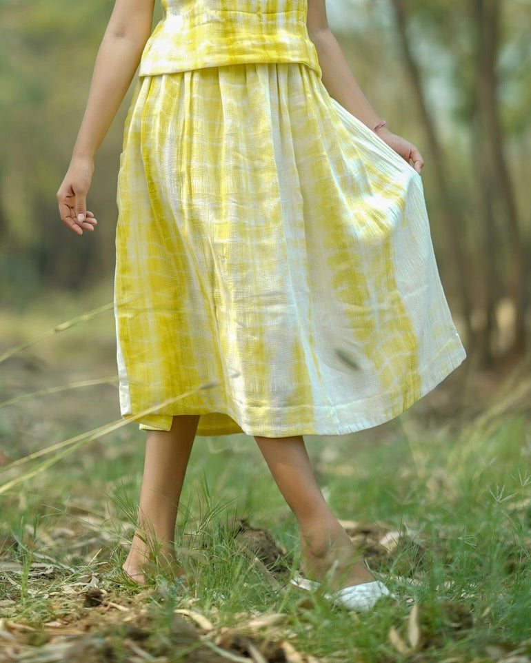 Shop yellow pleat midi skirt from Bebaak