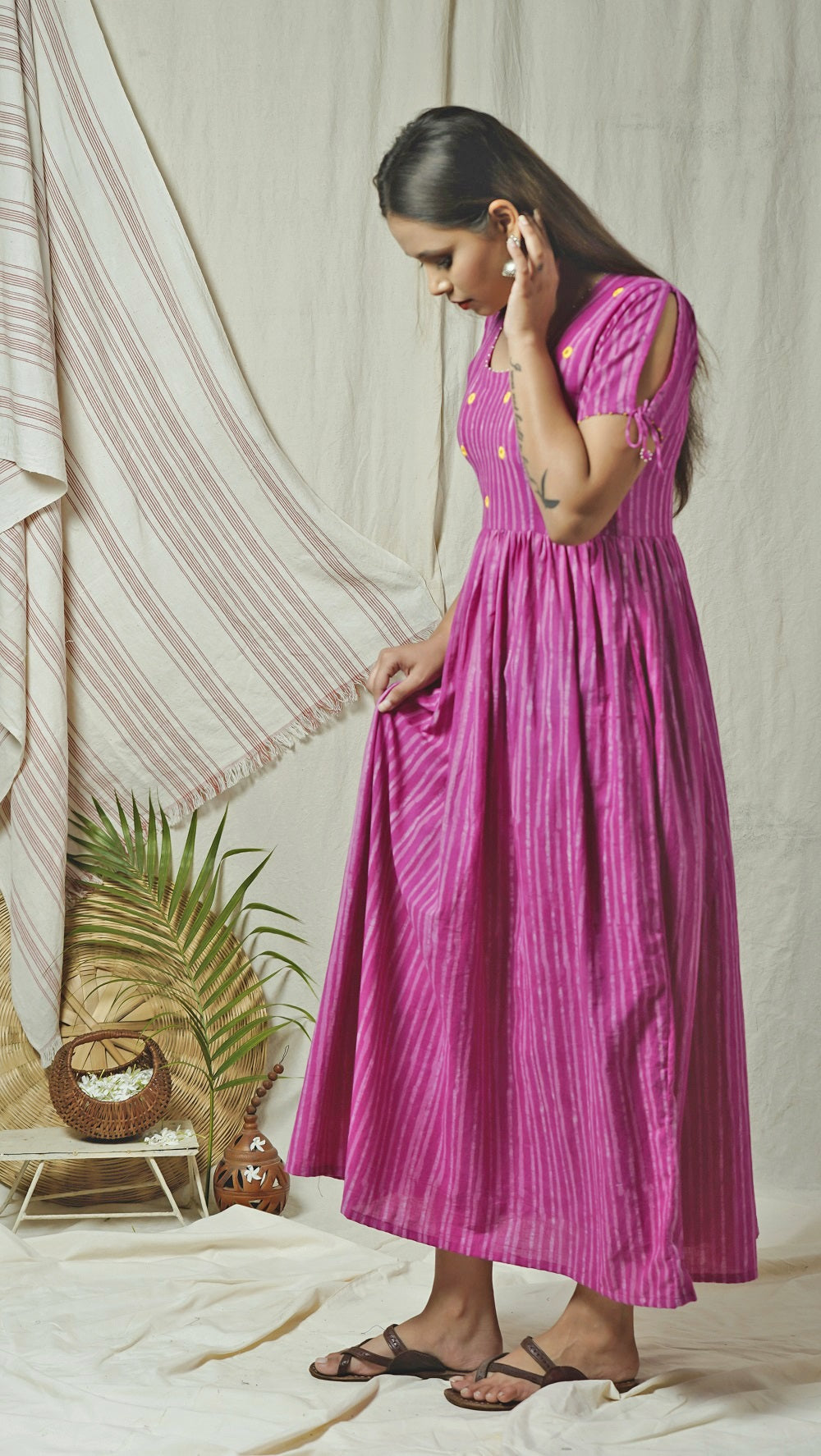 Pink block print maxi dress with knotted sleeves online at bebaakstudio.com