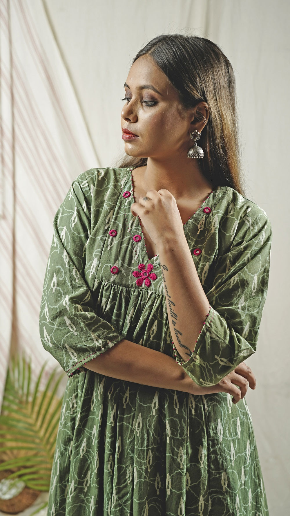 Green block print flowy embroidered dress online at bebaakstudio.com