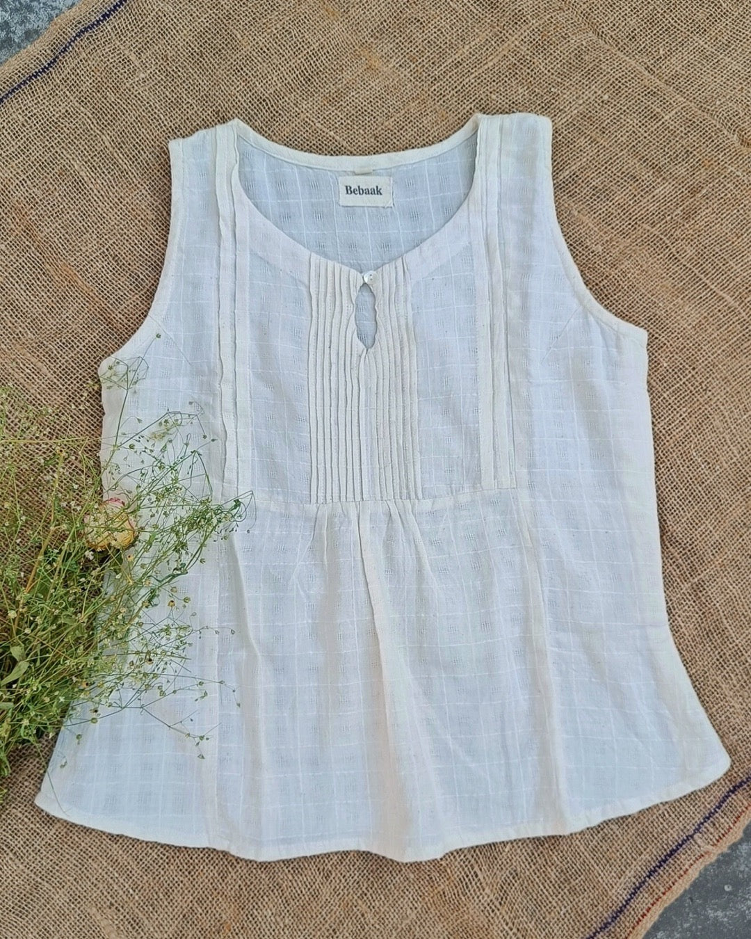 Off white sleeveless pure cotton top online at bebaakstudio.com