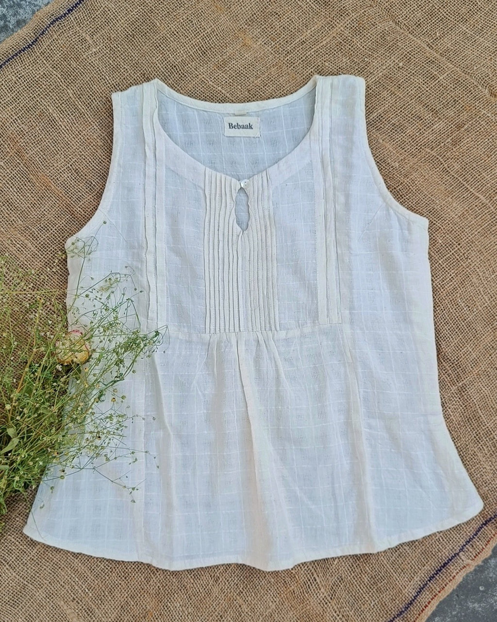 Off white sleeveless pure cotton top online at bebaakstudio.com