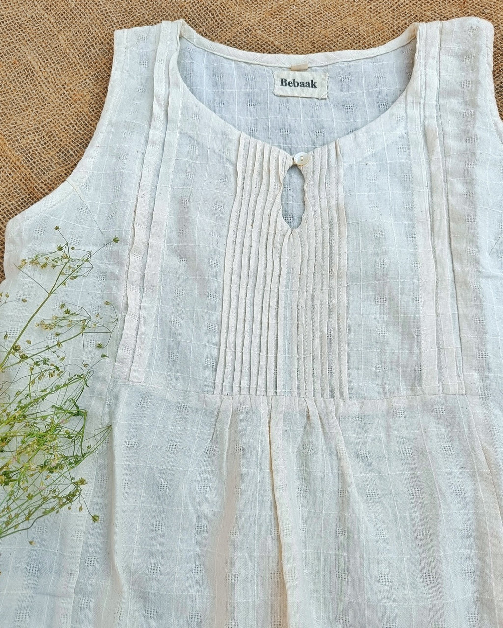 Off white sleeveless pure cotton top online at bebaakstudio.com