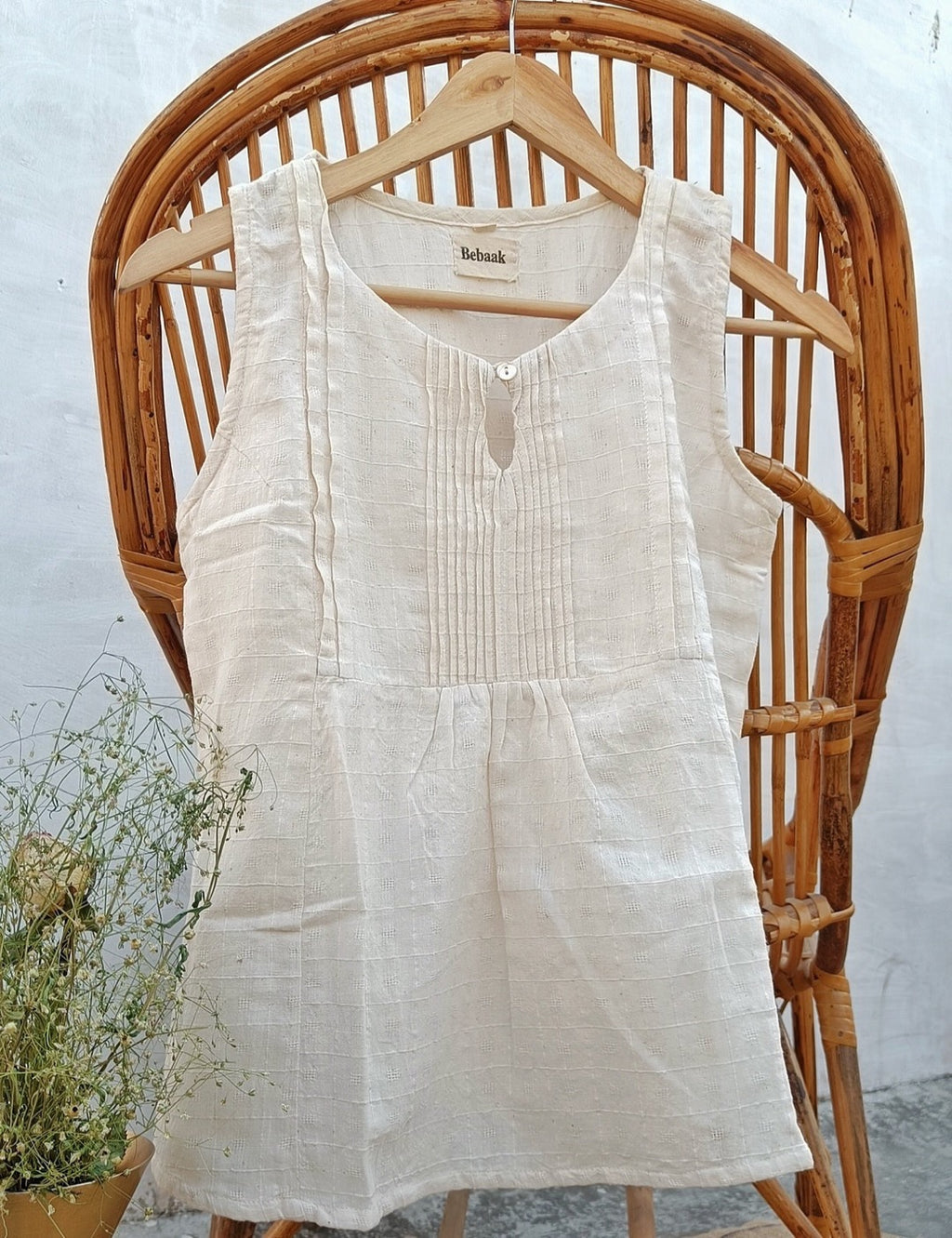 Off white sleeveless pure cotton top online at bebaakstudio.com