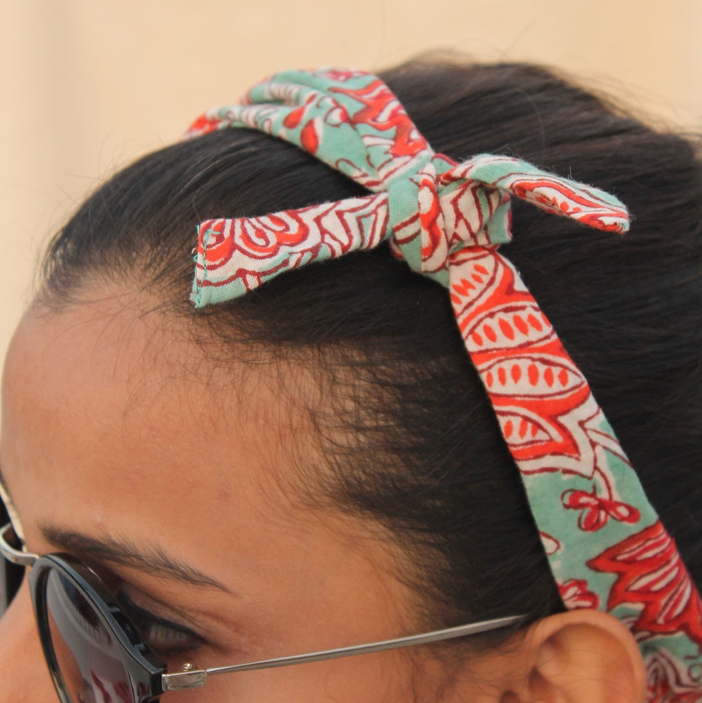Green block print knotted bow headband