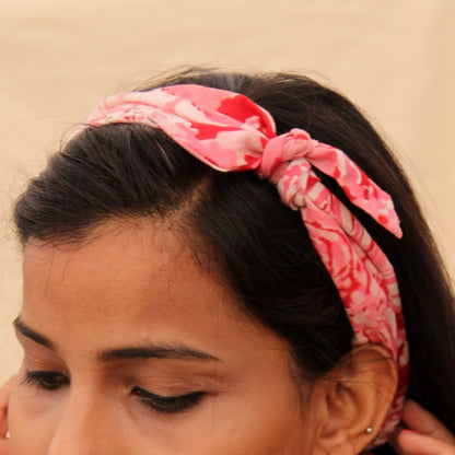 Pink block print knotted bow headband