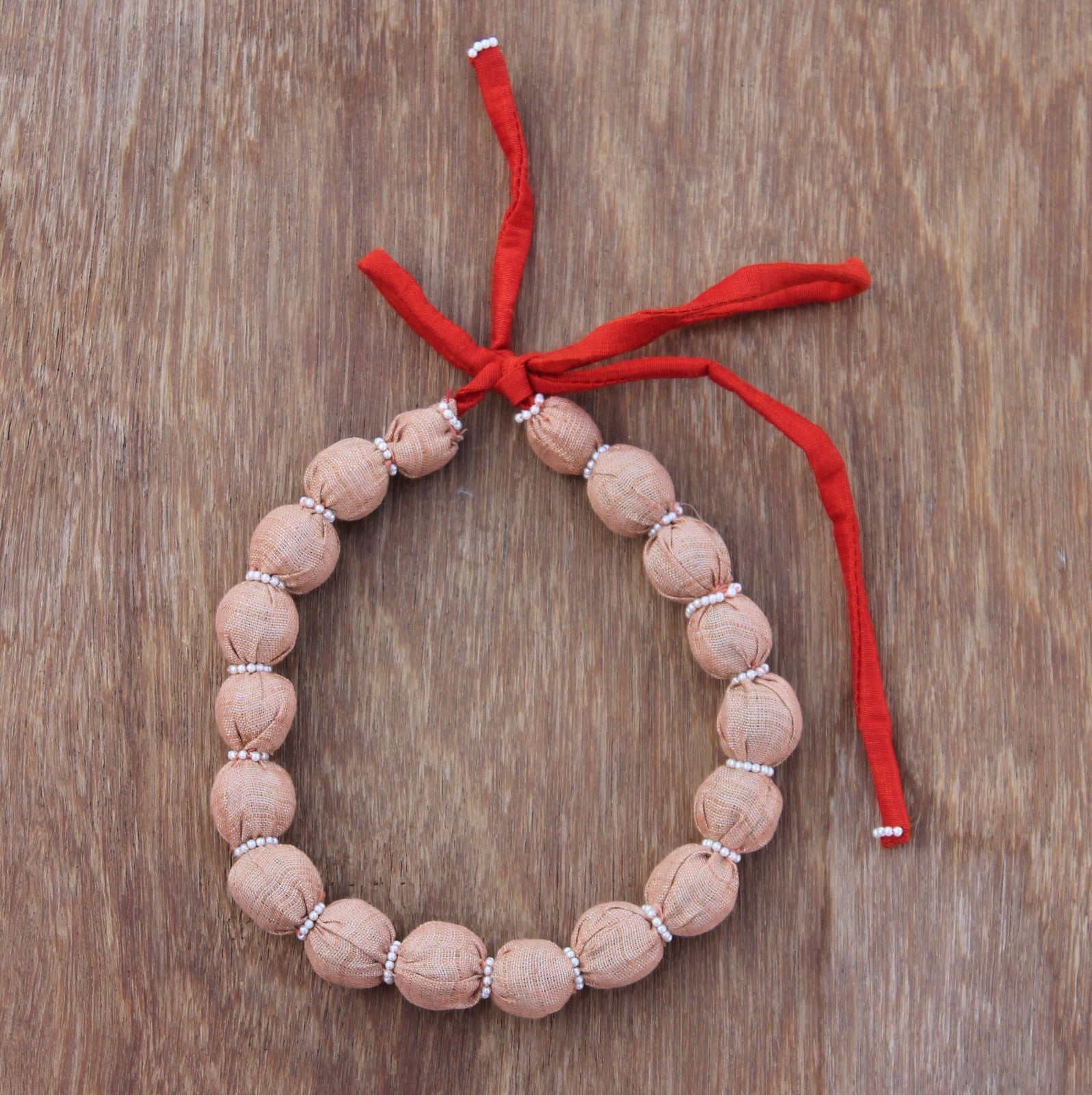 Updcycled textile necklace peach color beaded
