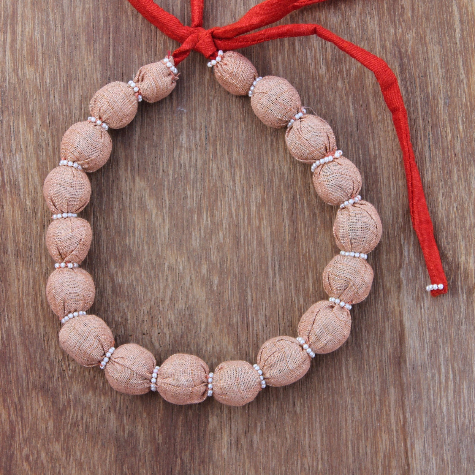 Updcycled textile necklace peach color beaded