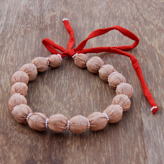 Updcycled textile necklace peach color beaded