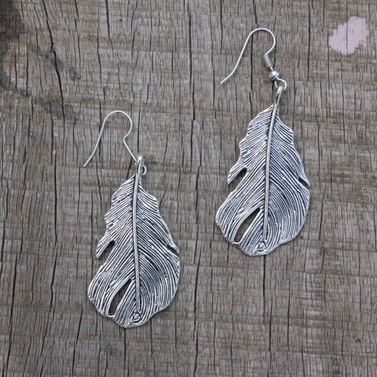 Earring: Danglers leaf motif and silver tone