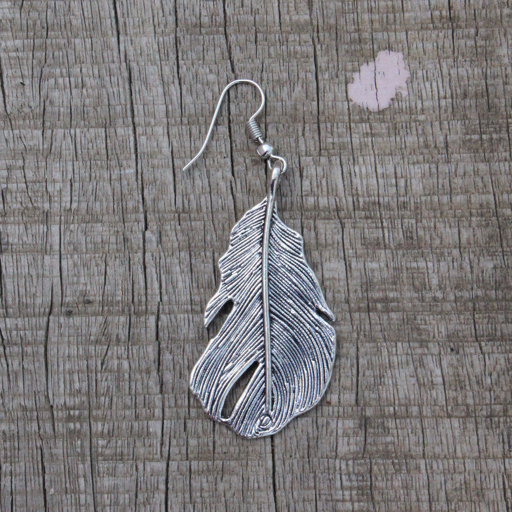 Earring: Danglers leaf motif and silver tone