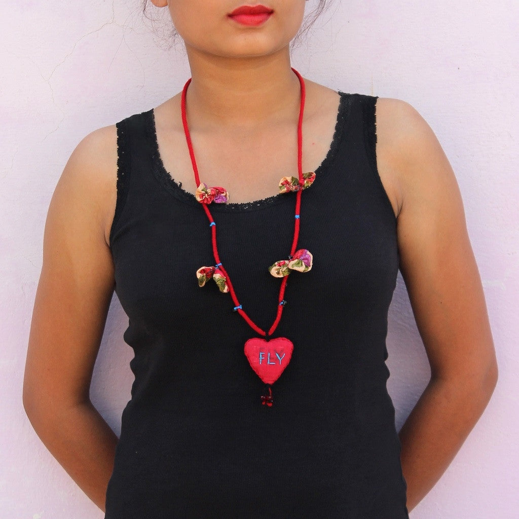 Up-cycled textile heart pendant necklace( Fly) by bebaak